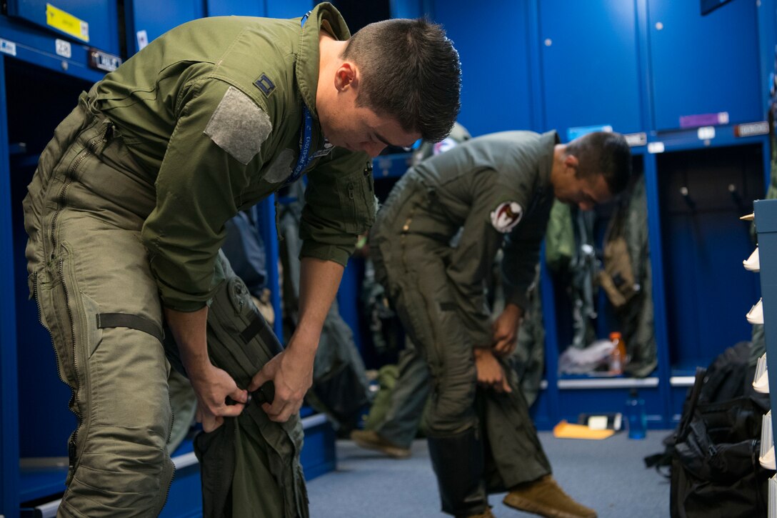 Pilots prepare for a flight.