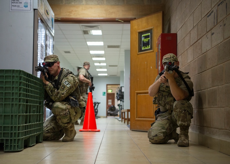 security forces sweep building
