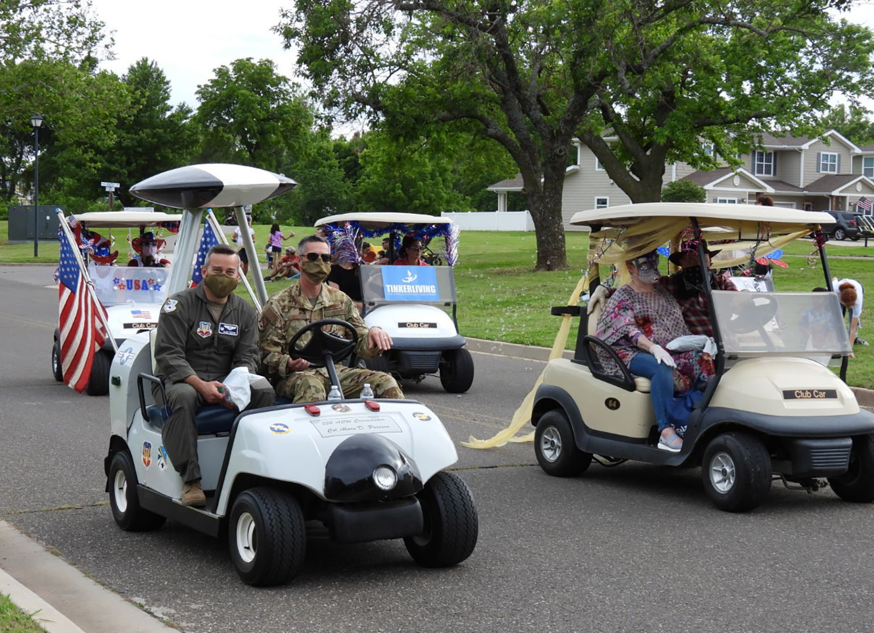 Tinker leaders, helping agencies parade through base housing > Tinker