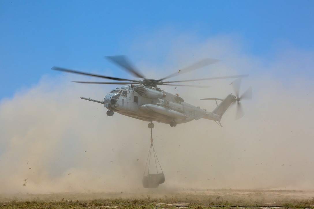 A CH-53E Super Stallion delivers fuel bladders to a forward arming and refueling point during routine sustainment on Karan Island, Saudi Arabia, May 27.