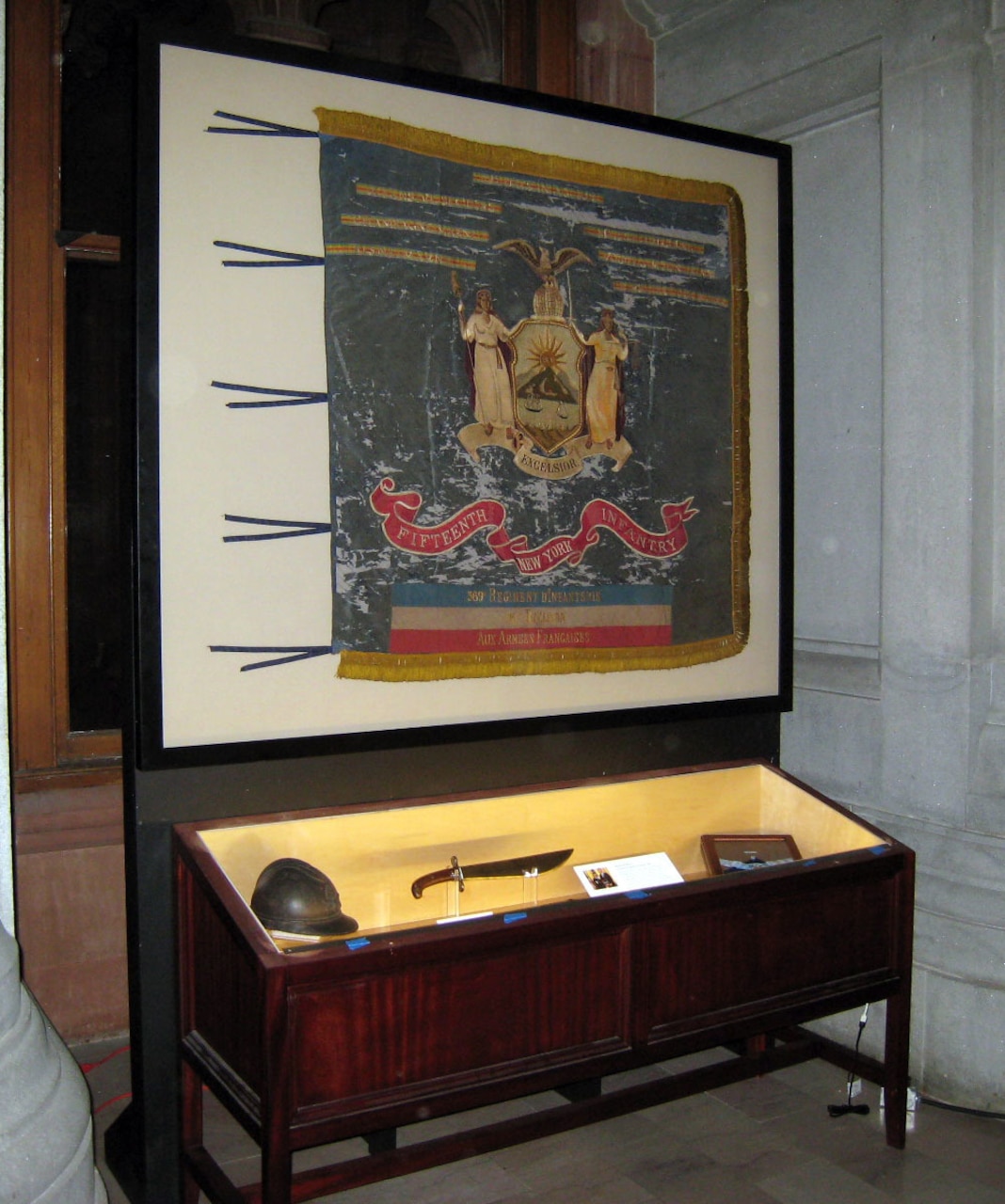 A museum display case holds artifacts.