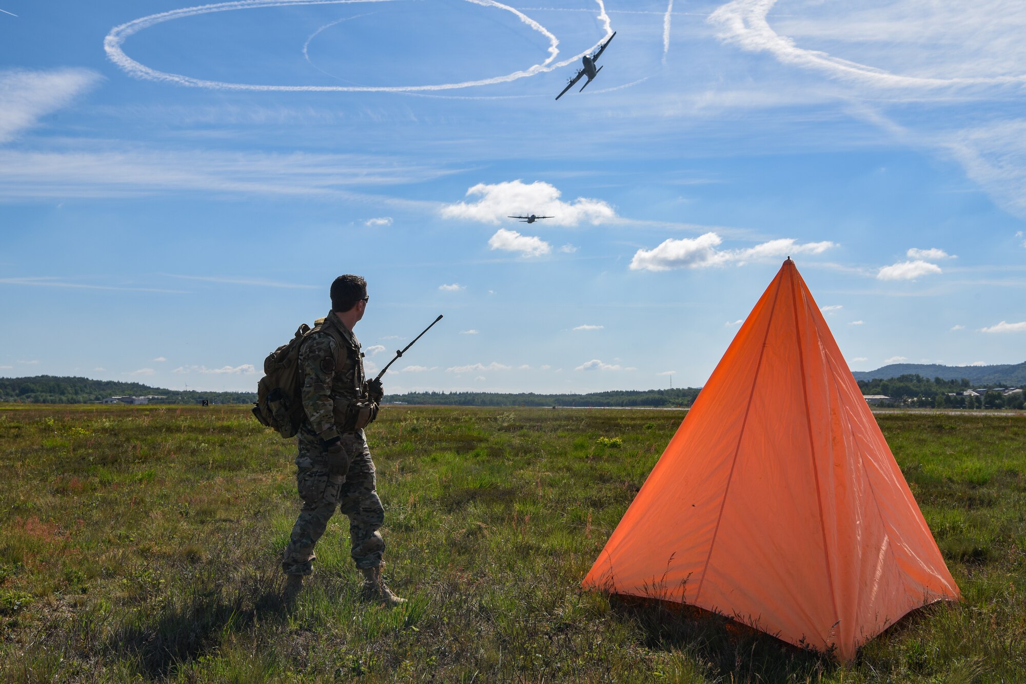 Photo of Airman setting up a drop zone for paratroopers