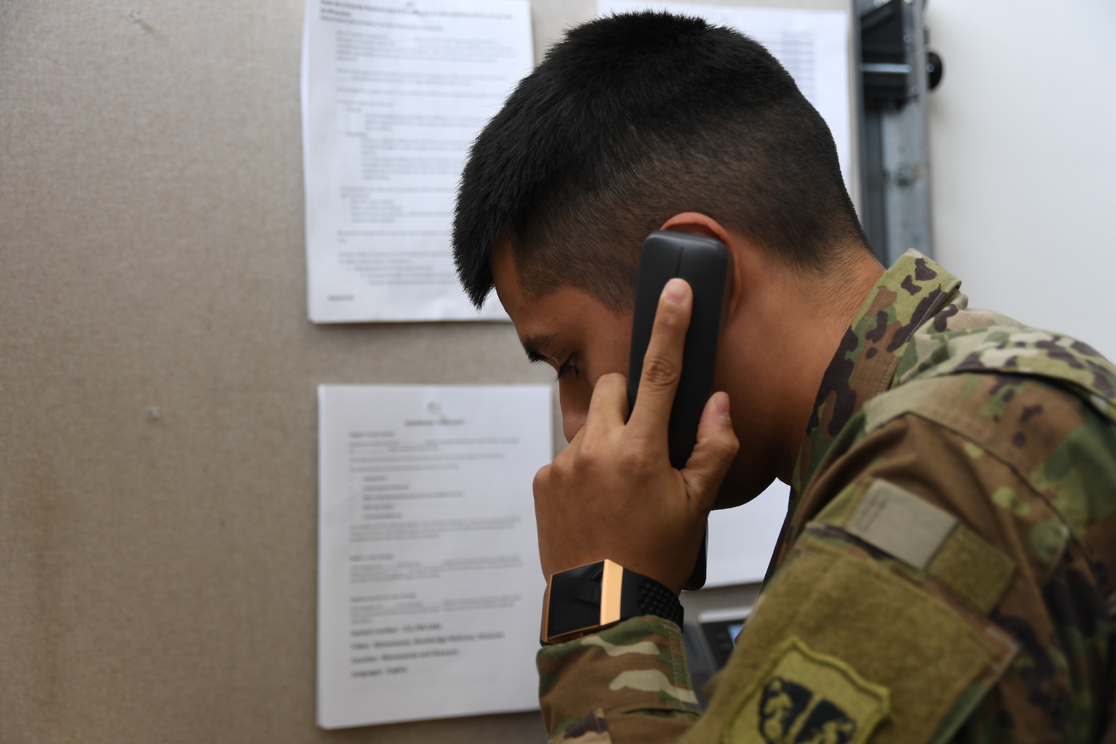 Wisconsin National Guard Spc. Erick Carranza informs people of COVID-19 test results in English or Spanish from a call center in Madison in May 2020. Thirty Guard Airmen and Soldiers are staffing the call center, with 16 of them bilingual in Spanish, Hmong, Portuguese, French, Mandarin Chinese, or German.