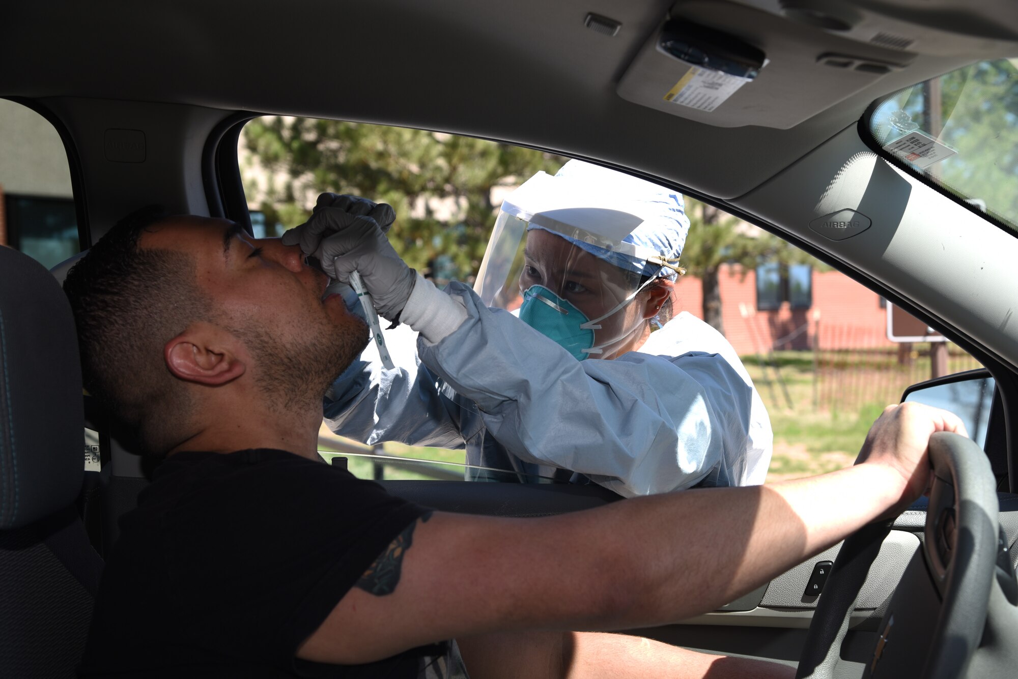 Doc conducts COVID swab