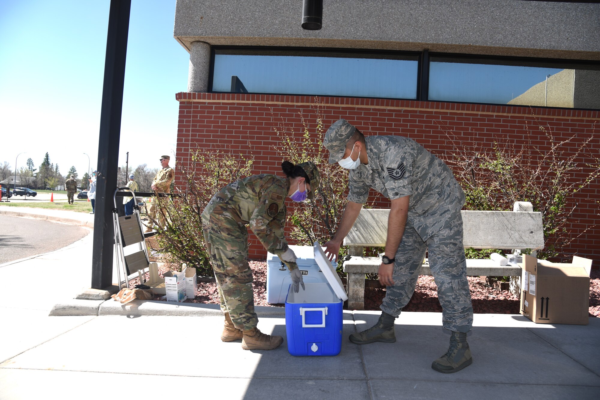 Airmen collect test kits