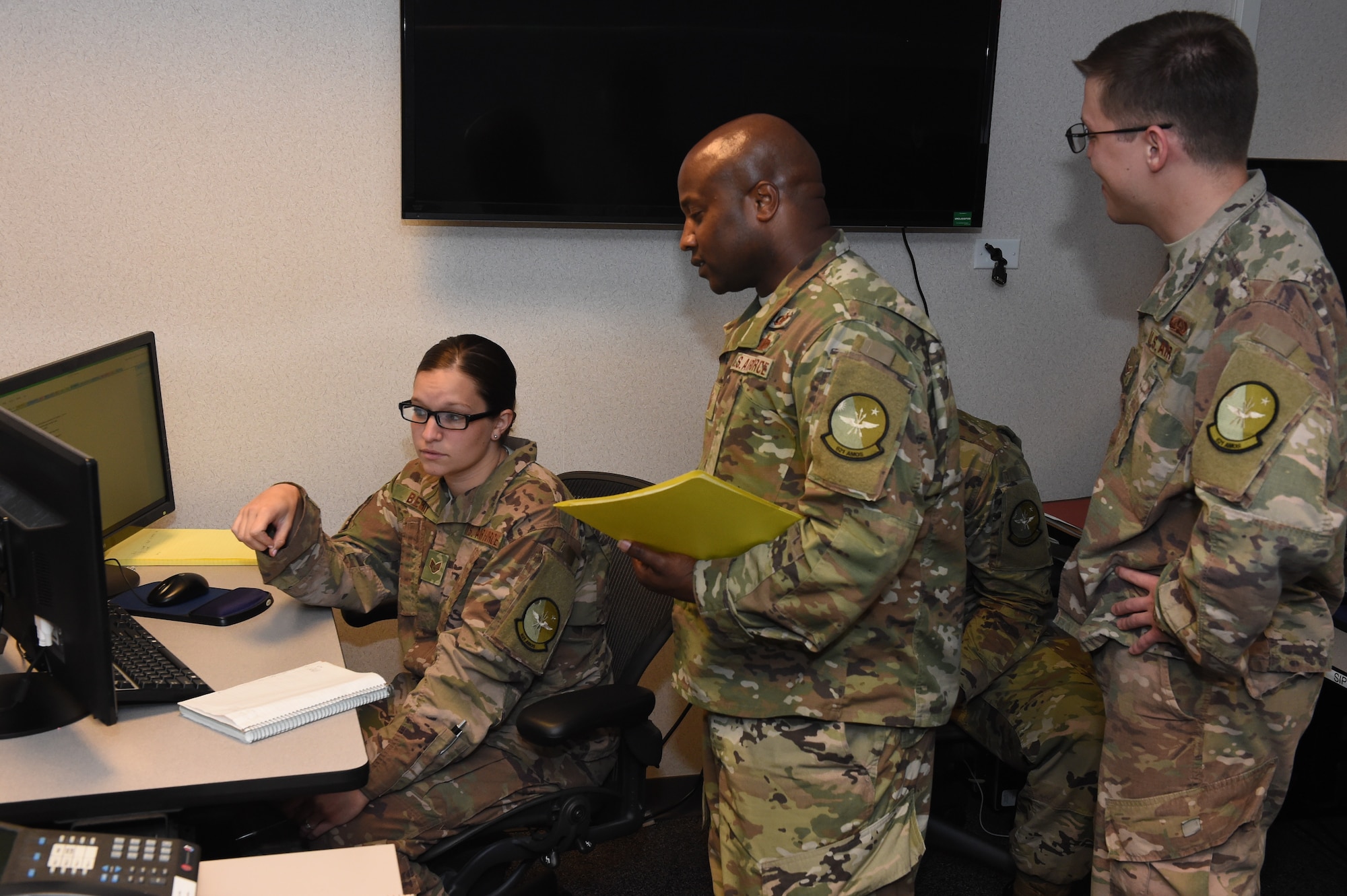 Airmen from the 321st, 621st and 514th Air Mobility Operations Squadrons provided temporary remote Command and Control functions for the Hurricane Michael relief effort here, Oct. 12, 2018. This total force team stood up an Air Mobility Division for the 601st Air Operations Center during its re-location from Tyndall Air Force Base, Fla., after Hurricane Michael destroyed their facilities. (U.S. Air Force Photo by Master Sgt. Charles Larkin Sr.)