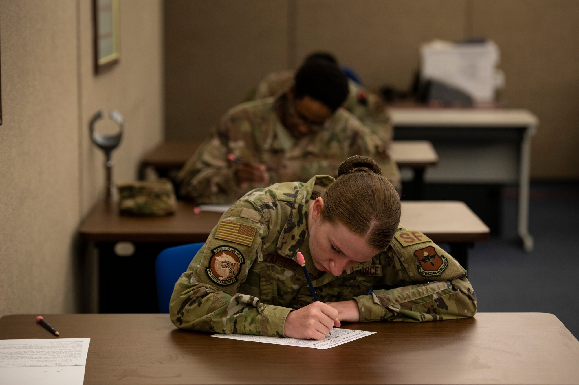 U.S. Air Force Senior Airman Jewel Favreau, assigned to the 97th Security Forces Squadron, fills out a promotion testing form, May 20, 2020 at Altus Air Force Base, Oklahoma