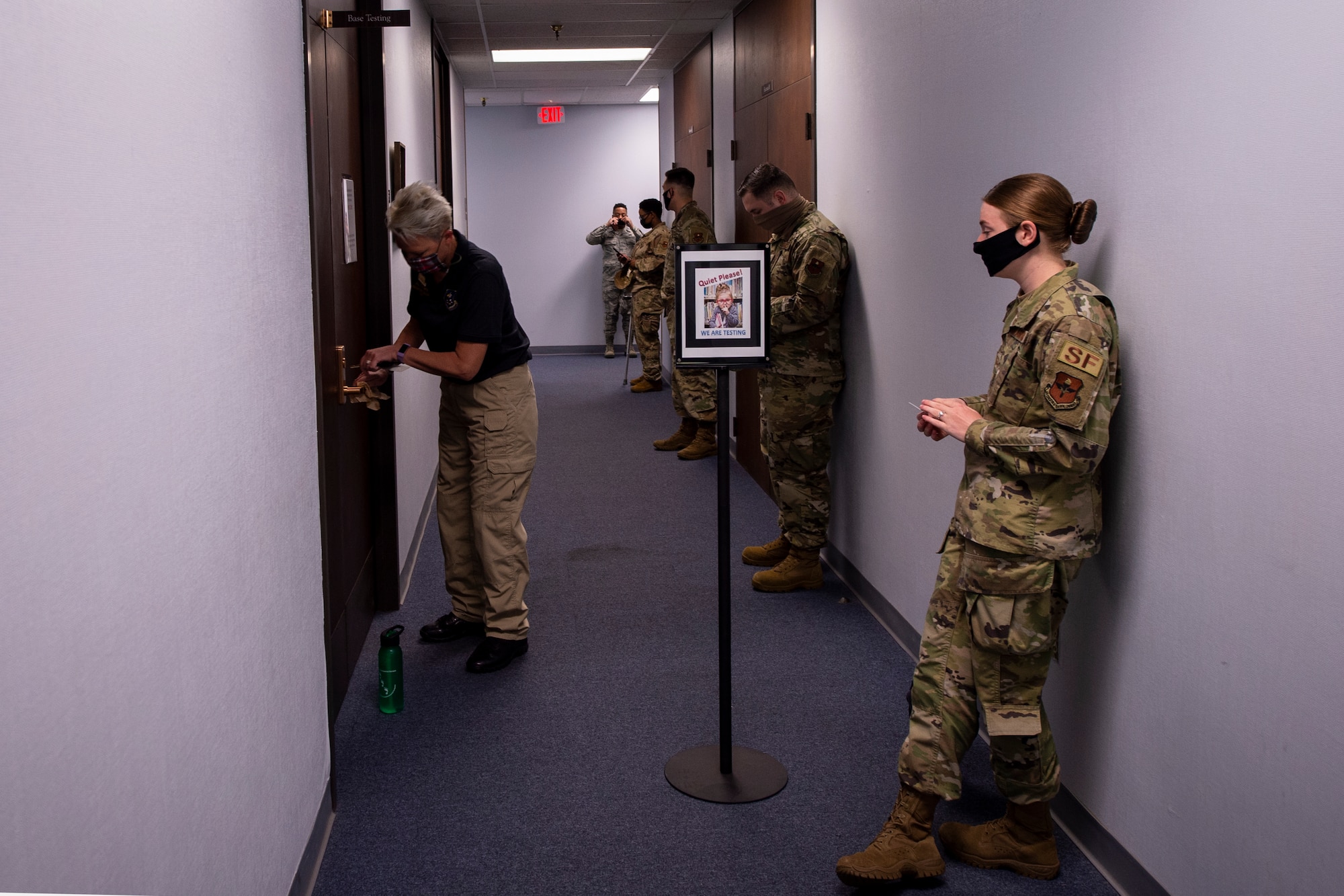 Jill Coles, the test control manager for the 97th Force Support Squadron, opens the base testing classroom prior to administering the Weighted Airmen Promotion System test, May 20, 2020 at Altus Air Force Base, Oklahoma.