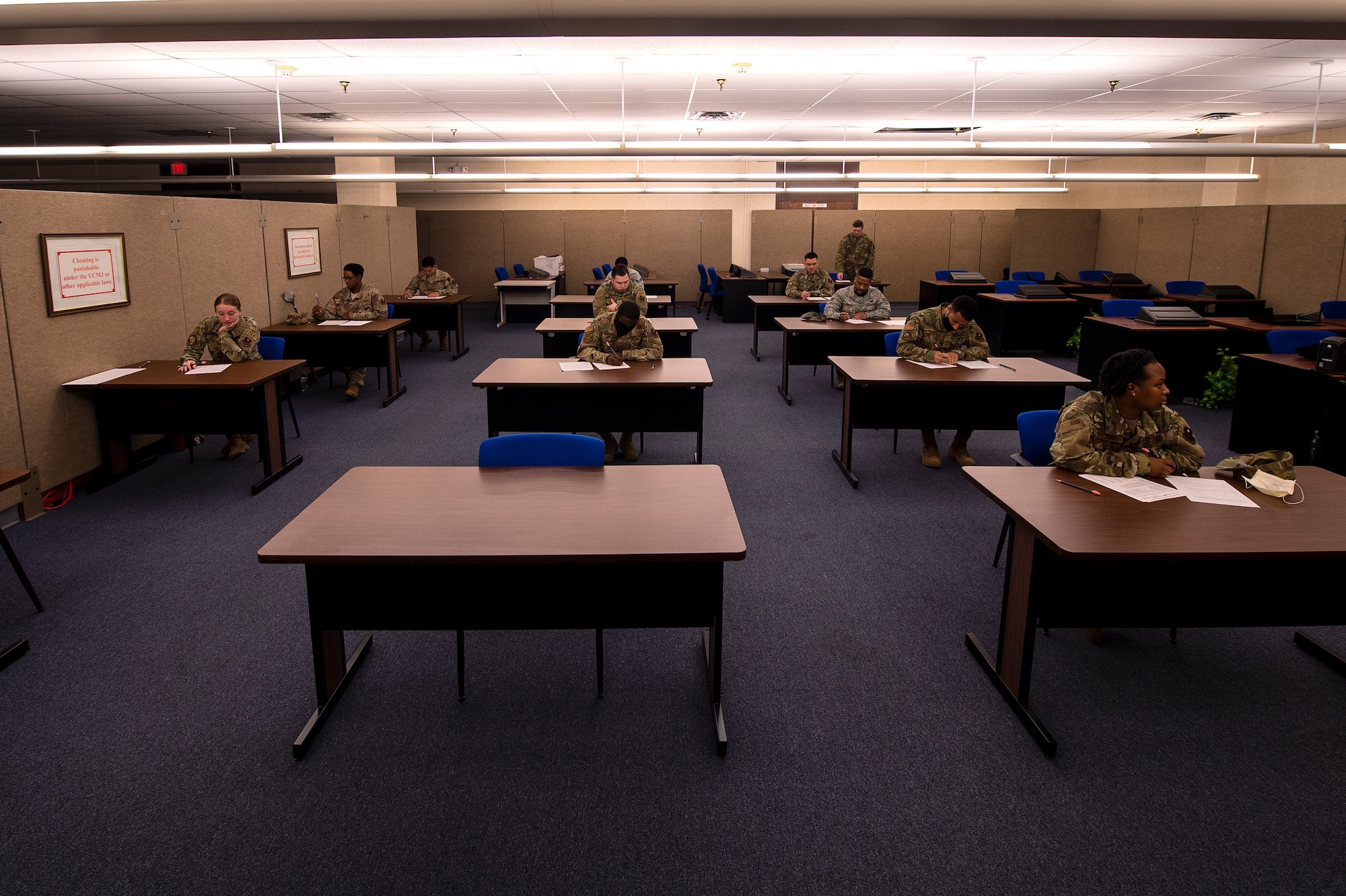 U.S. Air Force members fill out their Weighted Airman Promotion System testing sheets, May 20, 2020 at Altus Air Force Base, Oklahoma.