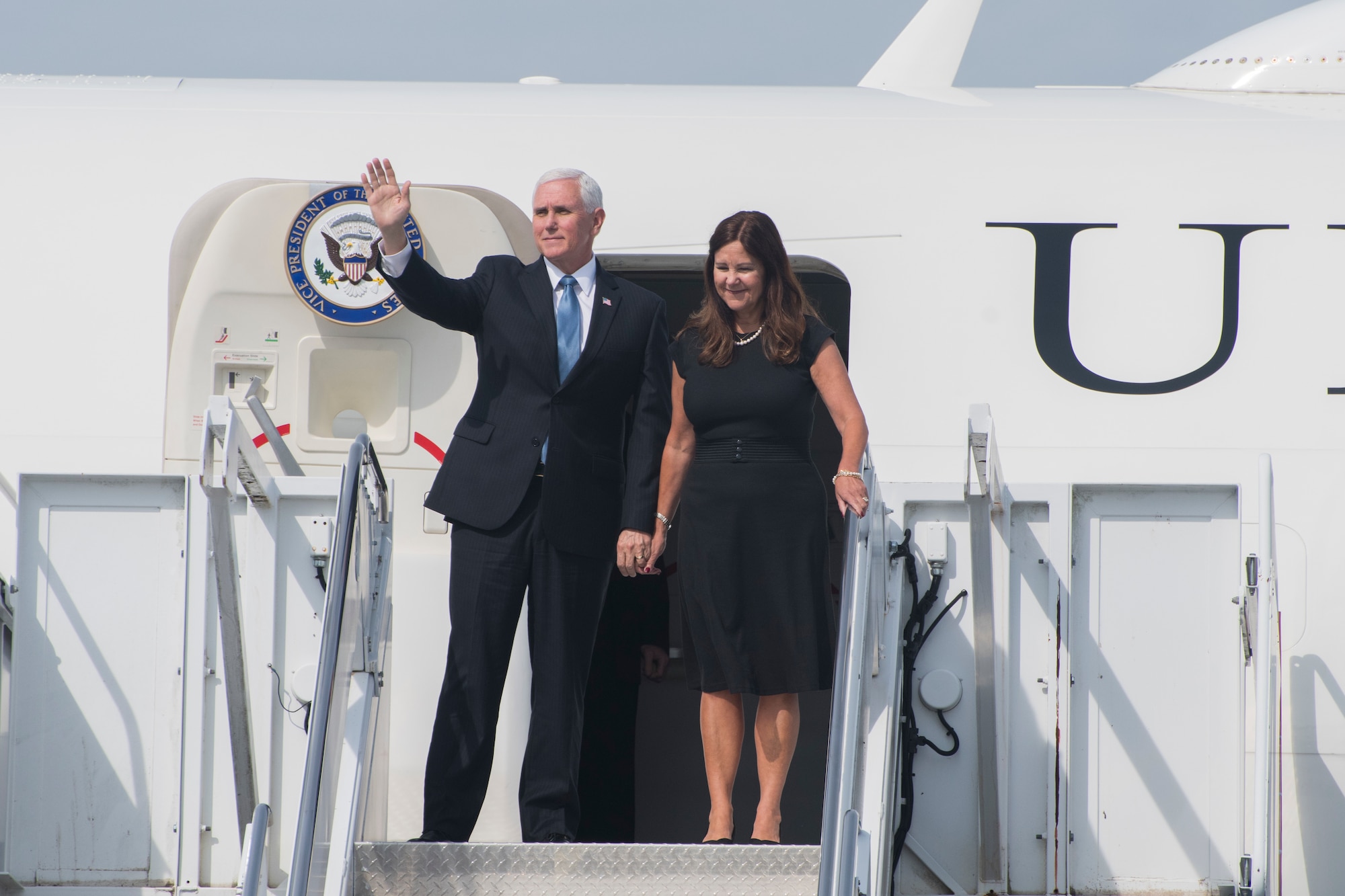 Vice President Michael Pence and his wife, Karen, wave to onlookers as they disembark Air Force Two at Dobbins Air Reserve Base, Ga. on May 29, 2020. Air Force Two landed here around 10 a.m., marking the second time in two weeks the vice president has visited Georgia. (U.S. Air Force photo/Andrew Park)