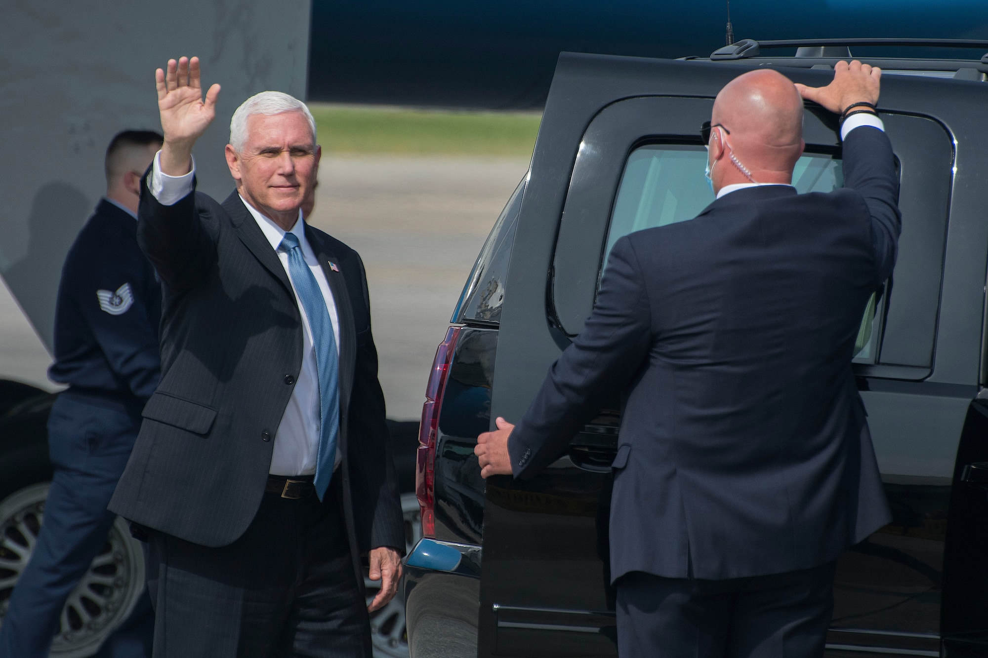 Vice President Michael Pence waves to the media before entering his vehicle in the motorcade at Dobbins Air Reserve Base, Ga. on May 29, 2020. Air Force Two landed here around 10 a.m., marking the second time in two weeks the vice president has visited Georgia. (U.S. Air Force photo/Andrew Park)