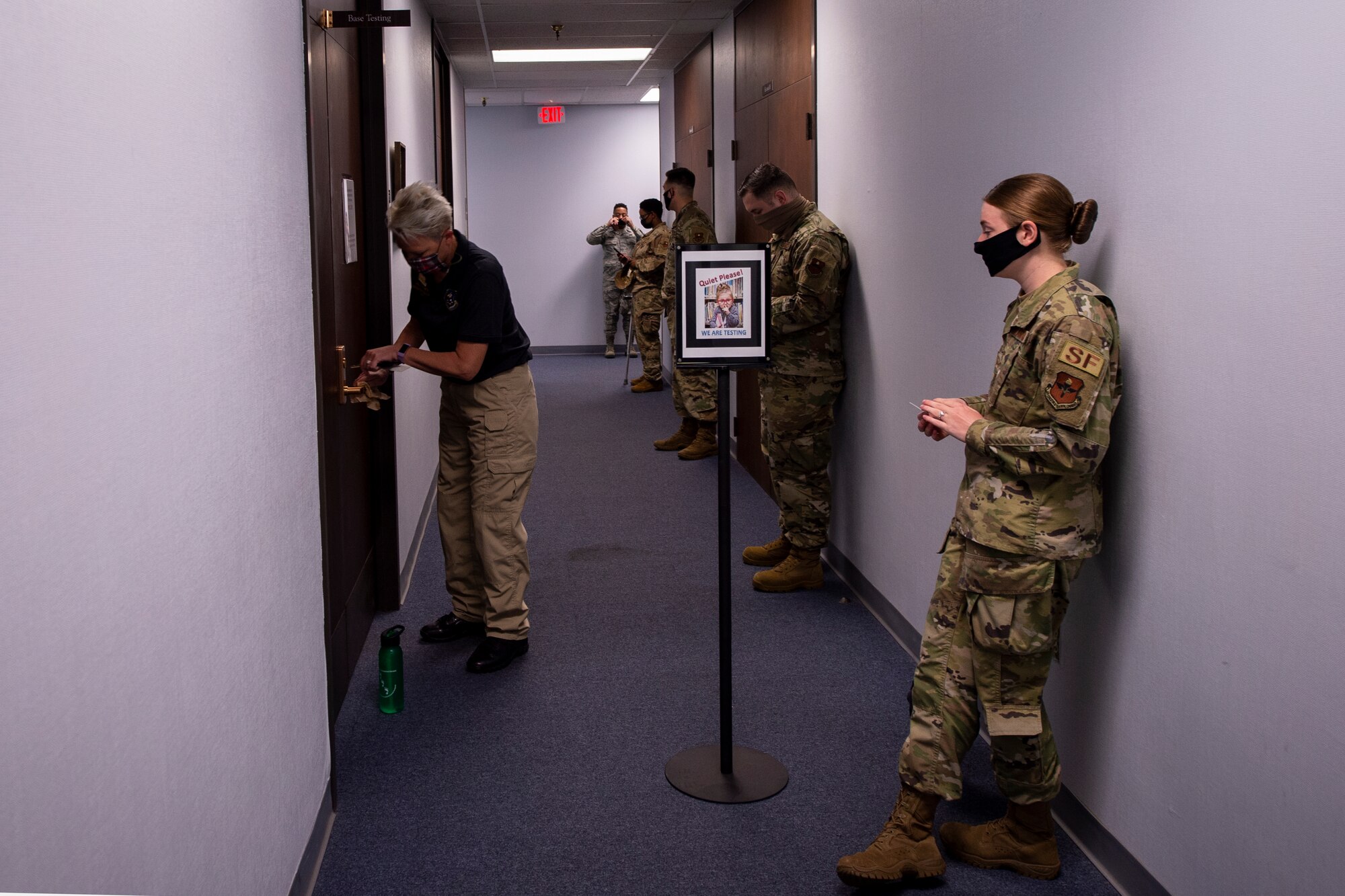 Jill Coles, the test control manager for the 97th Force Support Squadron, opens the base testing classroom prior to administering the Weighted Airmen Promotion System test, May 20, 2020 at Altus Air Force Base, Oklahoma.