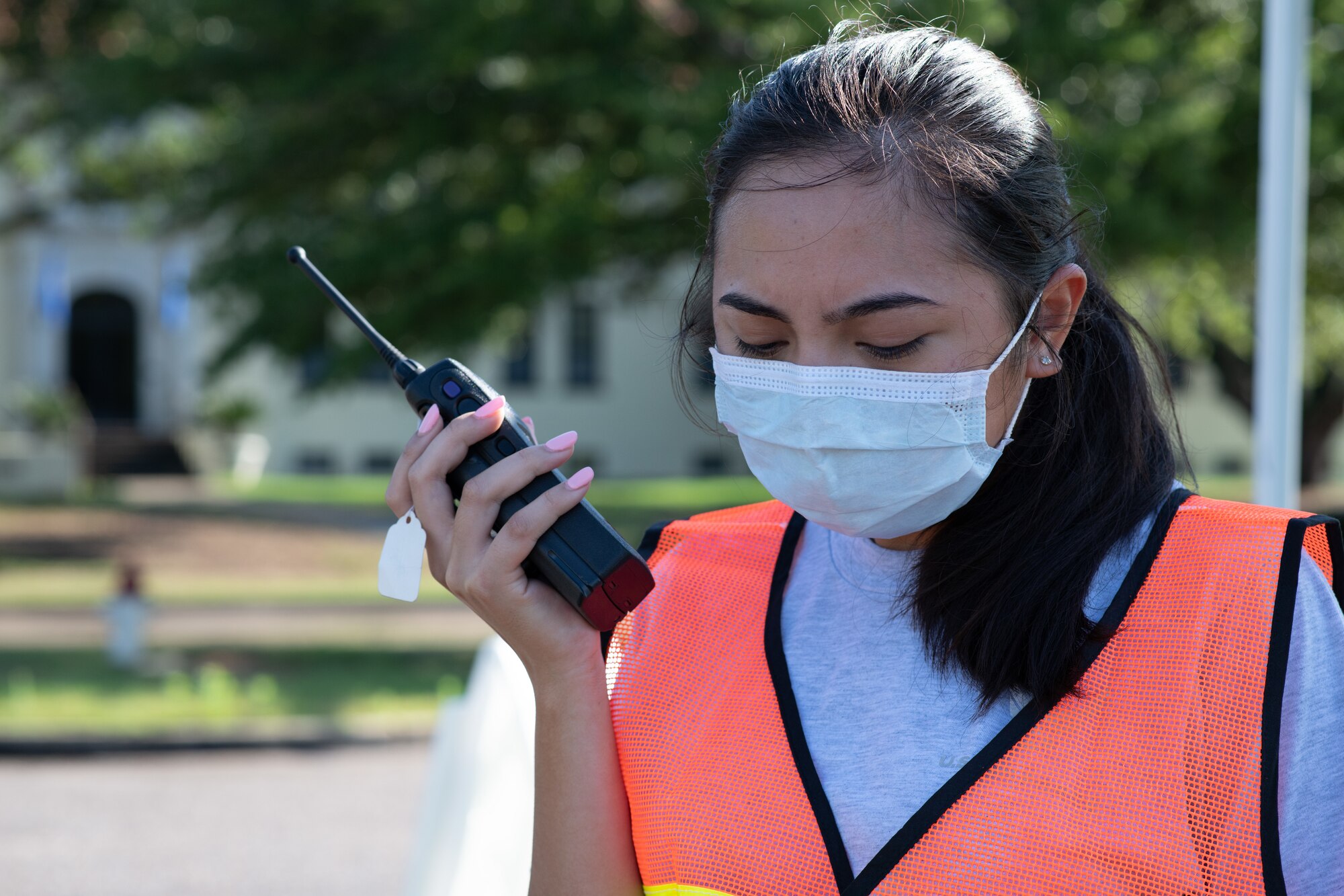 Airmen from the 42nd Military Personnel Flight out process Air Command and Staff College students, May 28, 2020, on Maxwell Air Force Base, Alabama. In order to maintain current safety precautions, the process was modified to allow the students to complete all required paperwork without having to leave their vehicles. (U.S. Air Force photo by Senior Airman Charles Welty)