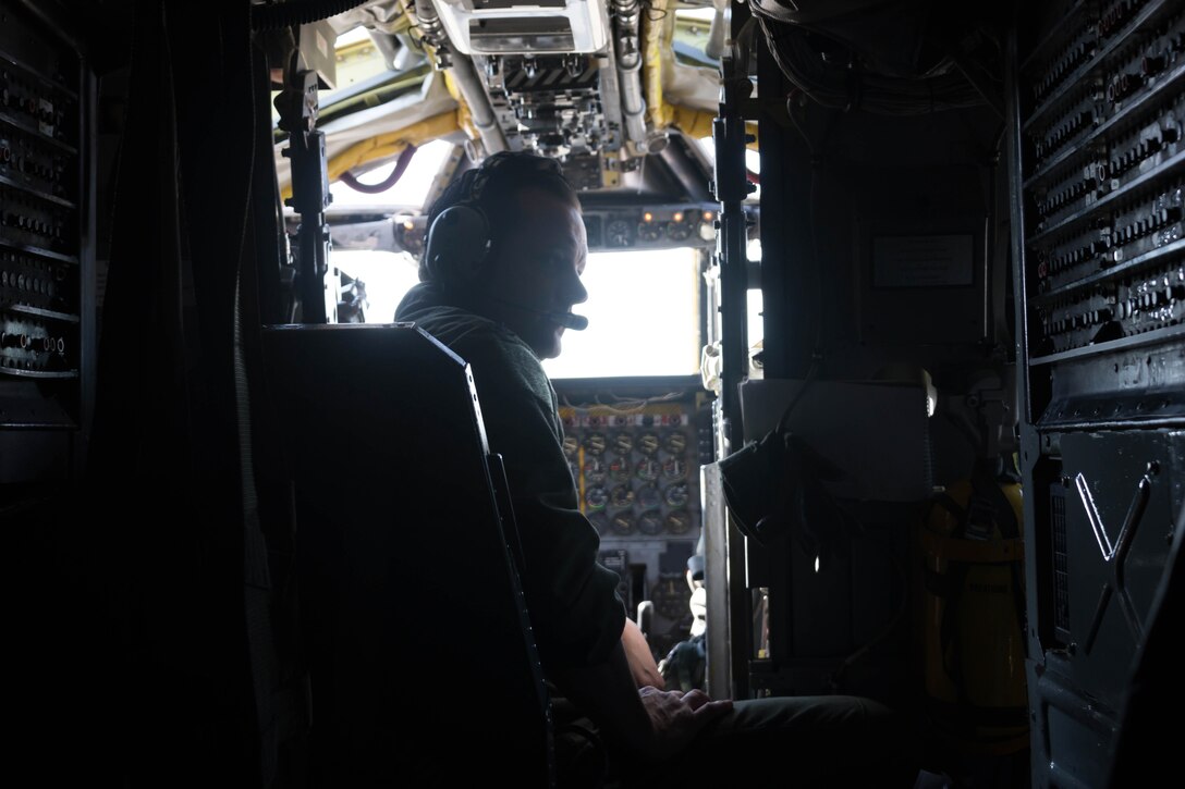 Airman sits in the cockpit of a B-52