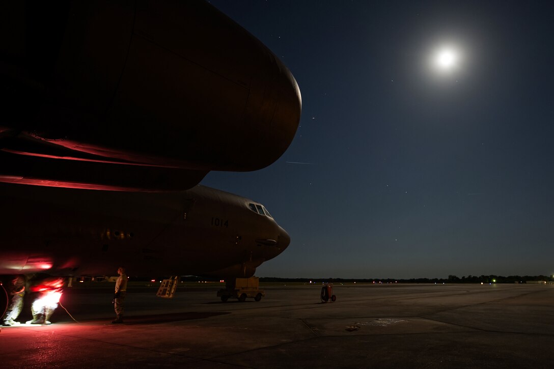 A full moon shines on a B-52