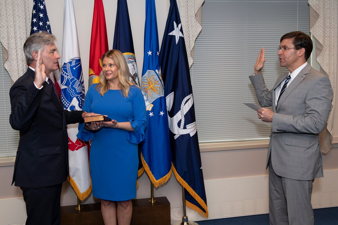 Defense Secretary Dr. Mark T. Esper swears-in retired Navy Rear Adm. Kenneth Braithwaite to serve as the next Secretary of the Navy, in Washington, D.C., May 29.