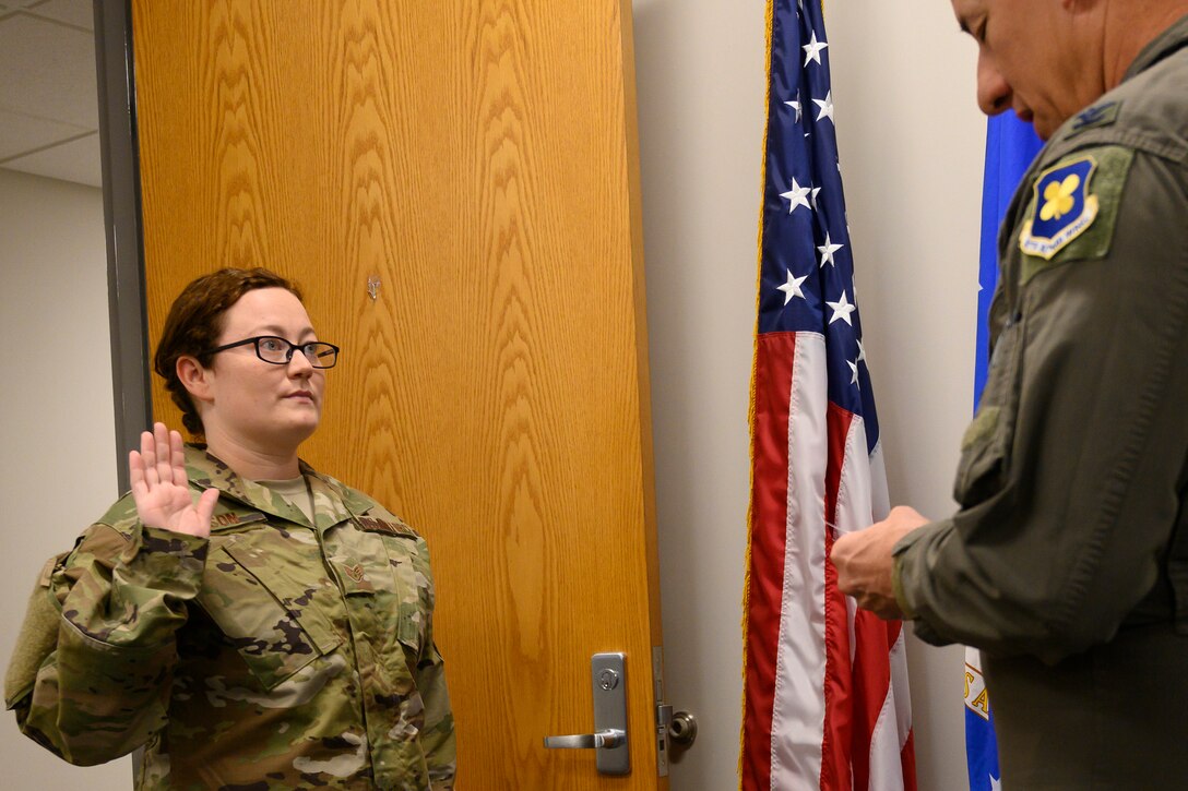 Photo of Airman taking oath of enlistment