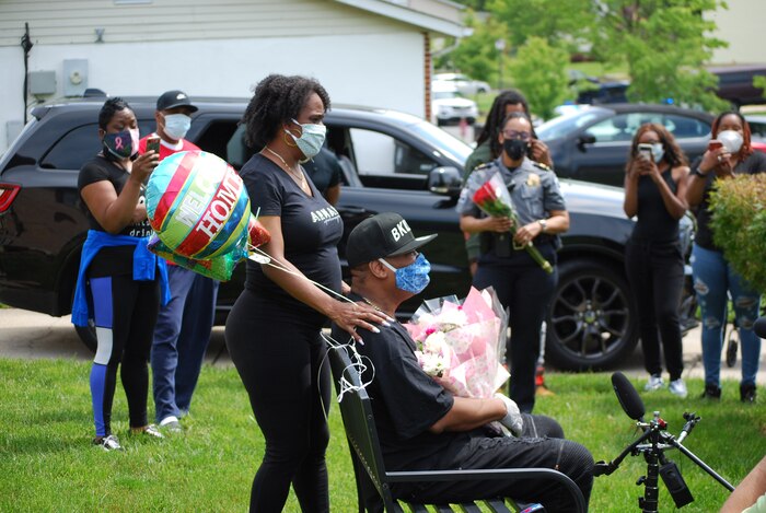 Patrick Bright, accompanied by his wife, Pamela, receives a warm welcome home in Clinton, Maryland, May 15, 2020. (Photo by Pentagon Force Protection Agency)