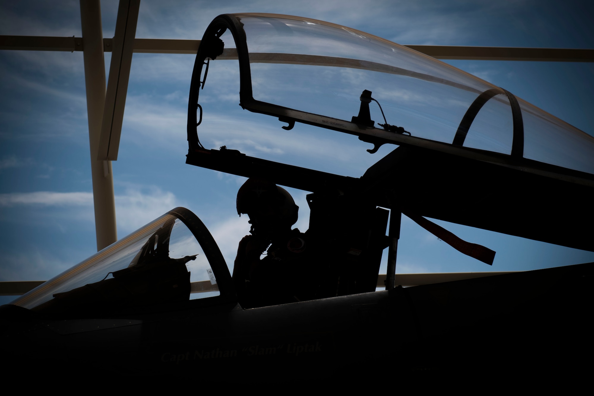 A pilot prepares in is aircraft