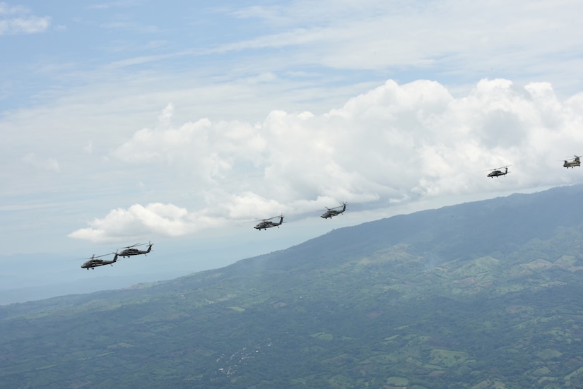 Four U.S. Army UH-60L Blackhawks and a CH-47 Chinook assigned to the 1st Battalion, 228th Aviation Regiment fly in formation during a Battalion Continuity of Operations (COOP) training exercise over Honduras and El Salvador, May 28, 2020.