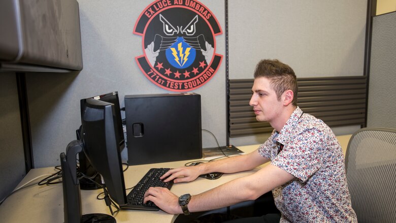 Sasha programmer Rony Maida,771st Test Squadron, developed the machine learning tool to aid engineers in data analytics. (Air Force photo by Giancarlo Casem)