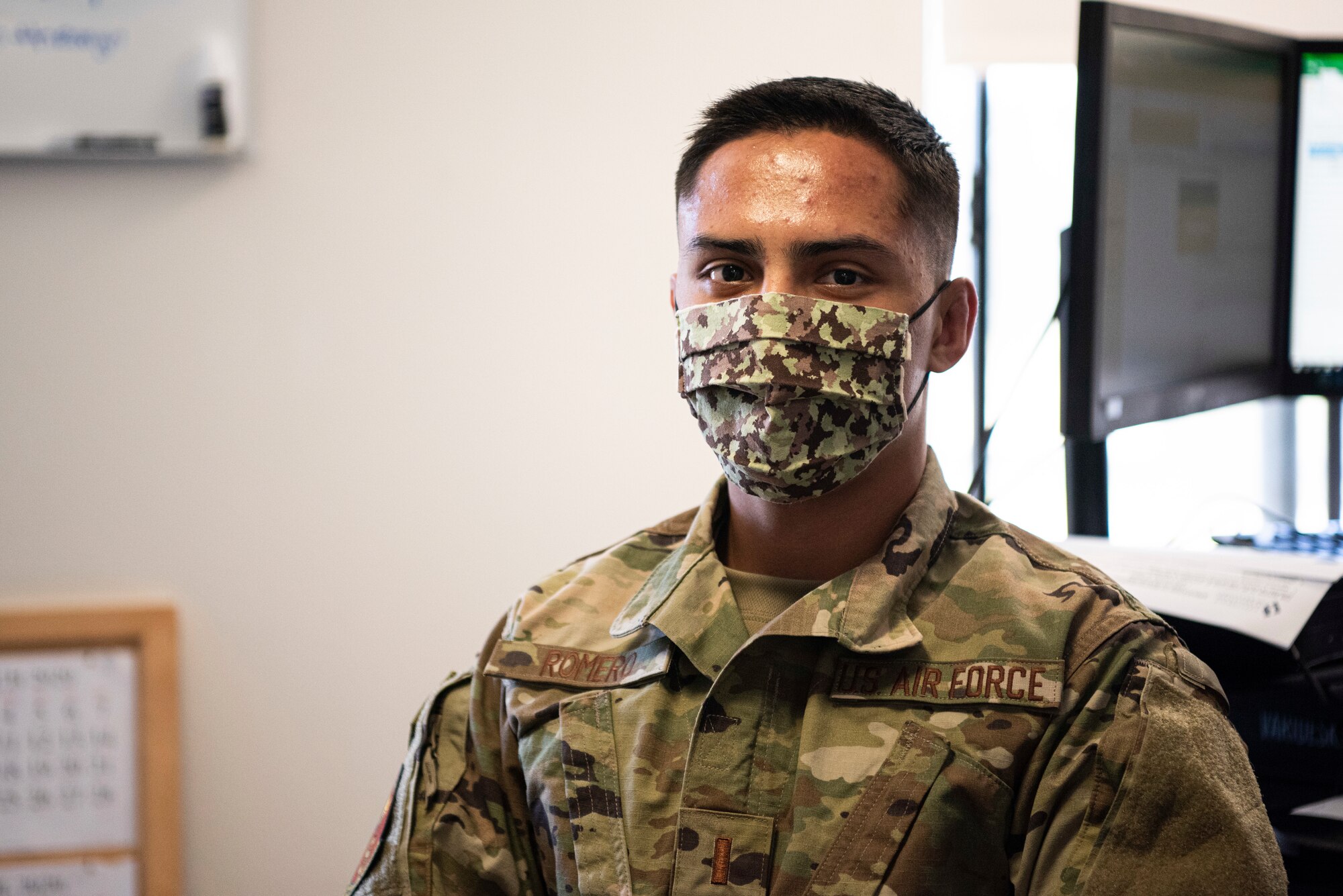 2nd Lt. Drew Romero, 30th Comptroller Squadron deputy budget officer, poses for a photo May 21, 2020, at Vandenberg Air Force base, Calif. While the 30th CPTS has closed its doors to in-person appointments due to COVID-19, they have been working to ensure members’ needs are still being met by doing virtual appointments. (U.S. Air Force photo by Senior Airman Hanah Abercrombie)