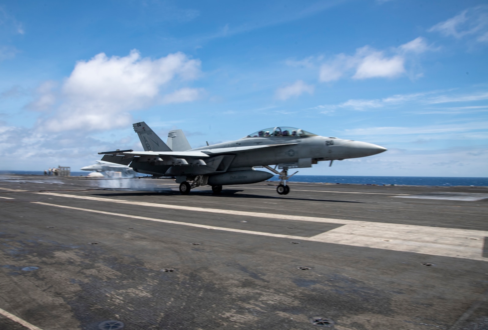 fighter jet lands on USS Harry S. Truman