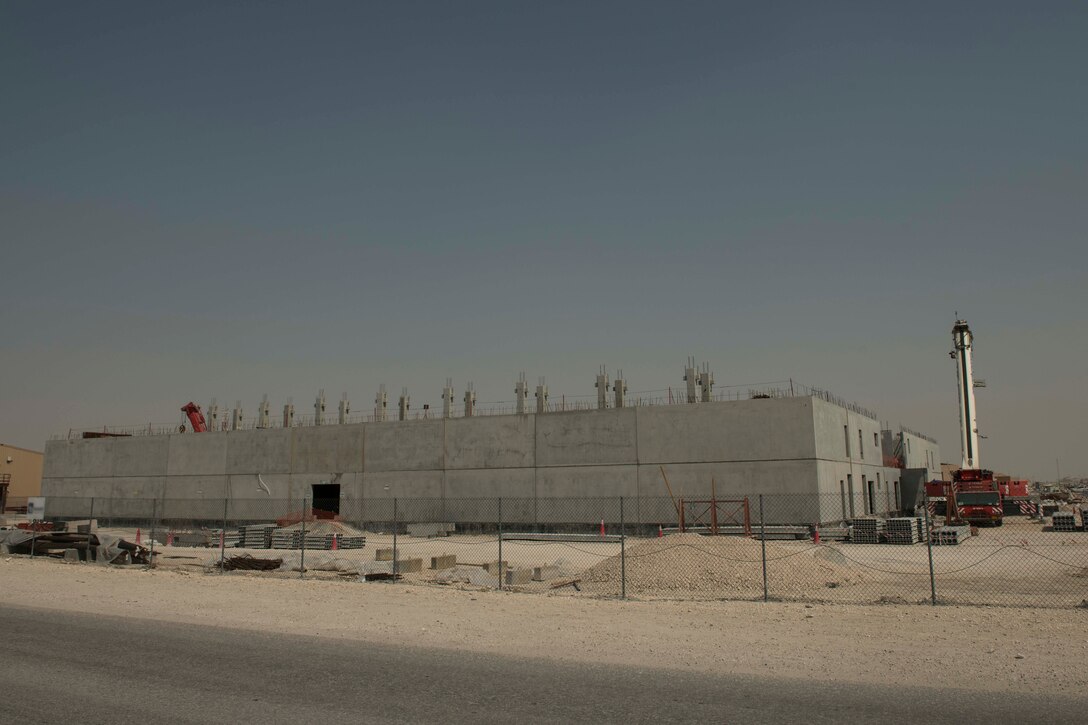The construction of 10 state-of-the-art dormitories, two dining facilities, and four mission support facilities continues at Al Udeid Air Base, Qatar, May 29, 2020.