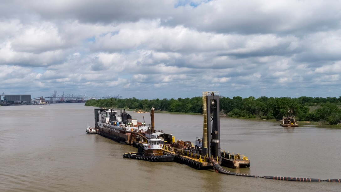 The Dredge Charleston of Norfolk Dredging is shown deepening the inner harbor of the Savannah River May 28, 2020, as part of the Savannah Harbor Expansion Project. The project is on schedule for completion in January 2022. Garden City Terminal is shown in the background.