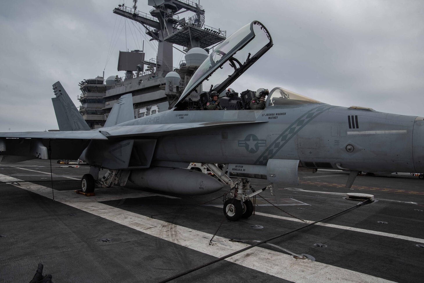 PHILIPPINE SEA (May 30, 2020) Commander, U.S. 7th Fleet, Vice Adm. William R. Merz conducts pre-flight checks on an F/A-18F Super Hornet attached to Strike Fighter Squadron (VFA) 102 on the flight deck of the Navy’s only forward-deployed aircraft carrier USS Ronald Reagan (CVN 76) during a scheduled visit. During the visit, Merz talked with Sailors about the health of the force and observed the ship’s operational readiness. Ronald Reagan, the flagship of Carrier Strike Group 5, provides a combat-ready force that protects and defends the United States, as well as the collective maritime interests of its allies and partners in the Indo-Pacific region. (U.S Navy photo by Mass Communication Specialist 2nd Class Samantha Jetzer)