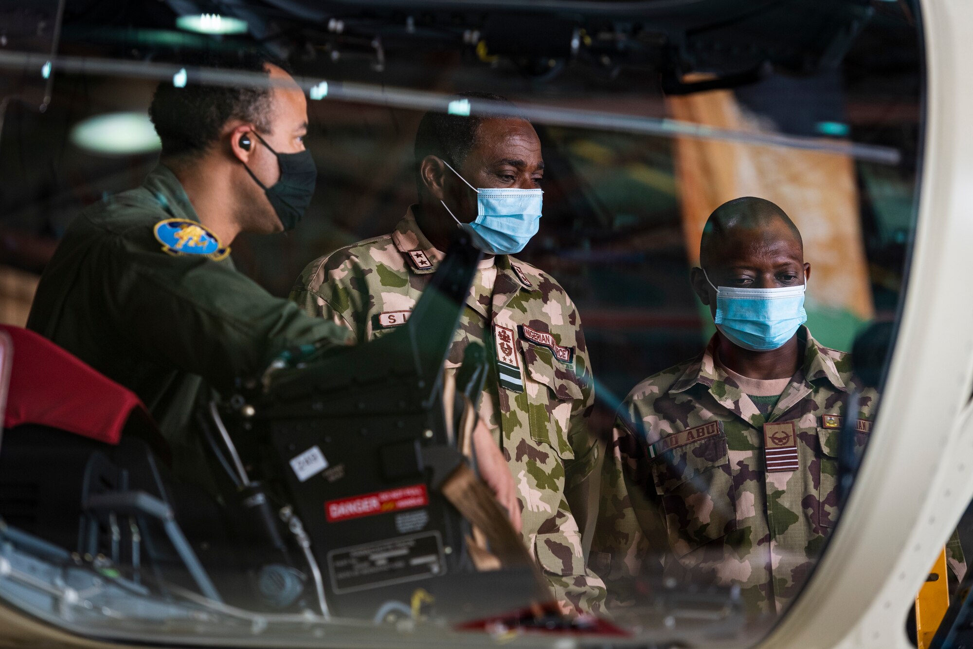 A photo of Airmen touring an aircraft