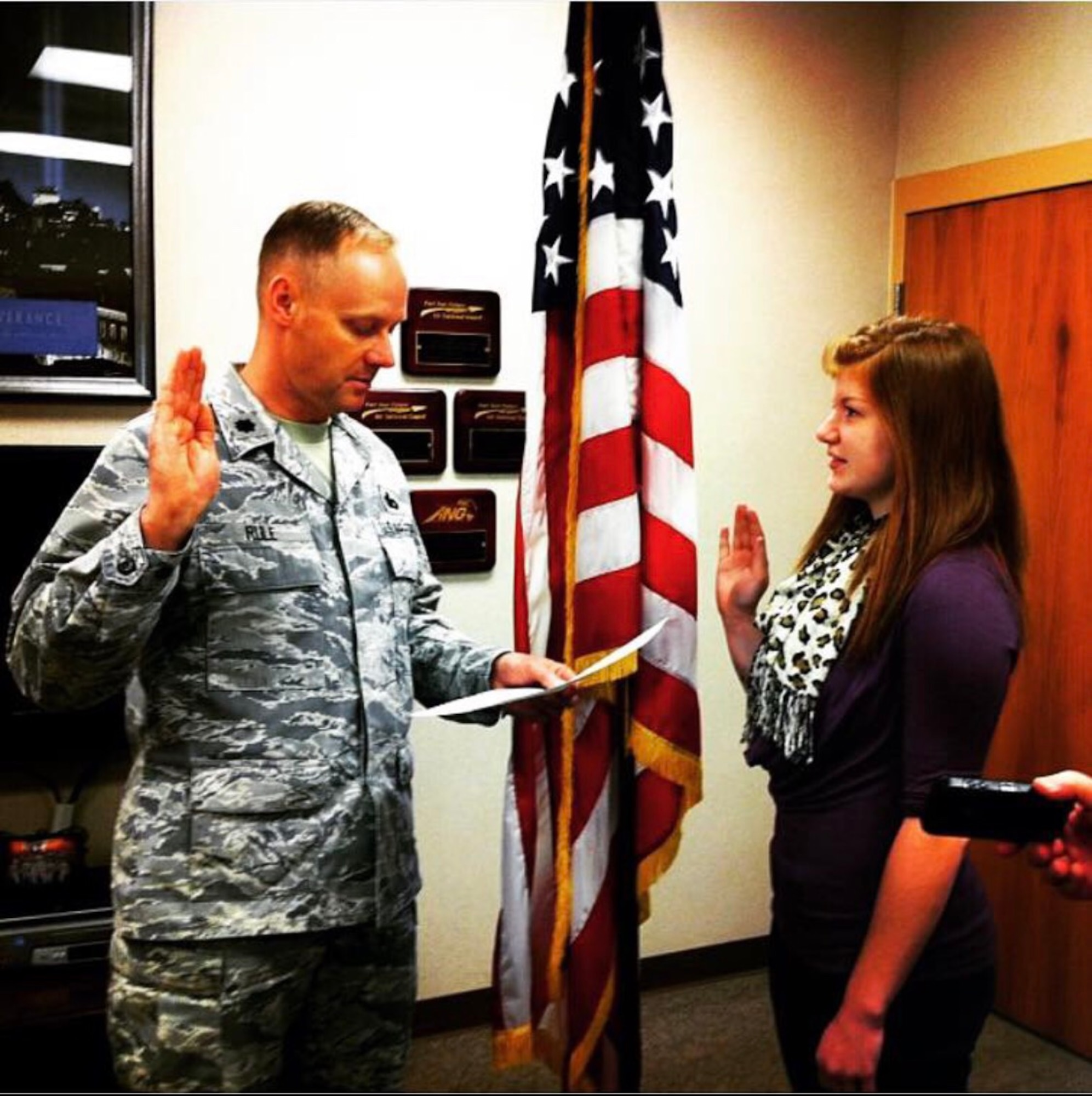 Kristianna Konietzko takes the oath of enlistment at the 148th Fighter Wing in February 2013. (courtesy photo)