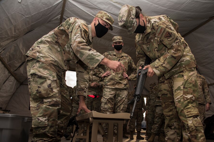 A photo of Airmen setting up for exercise