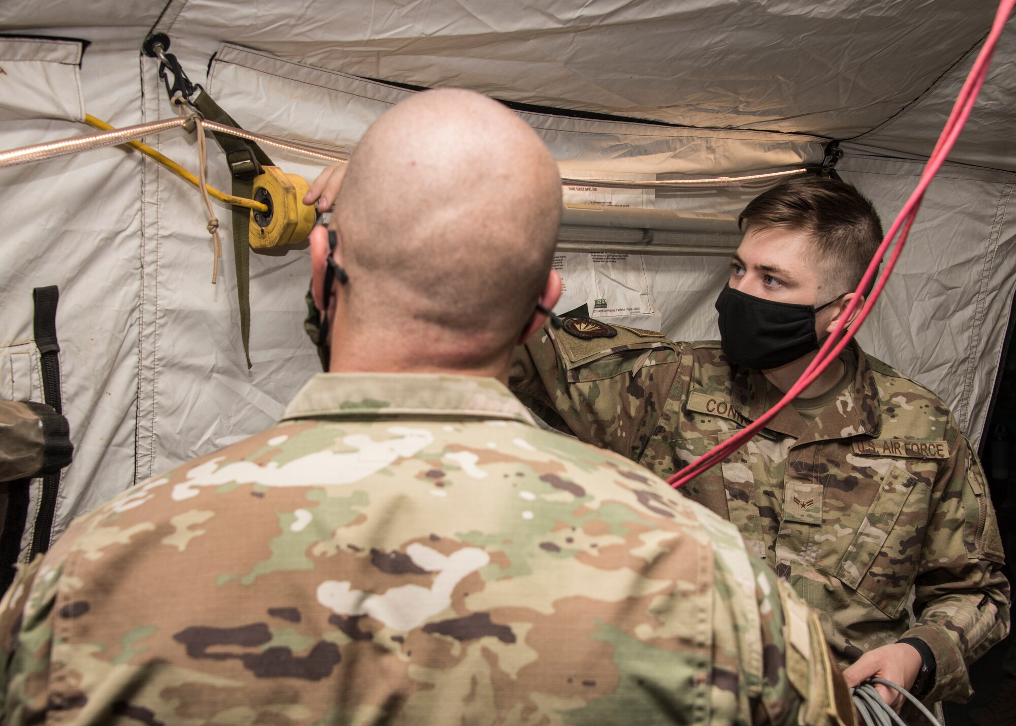 A photo of Airmen setting up for exercise
