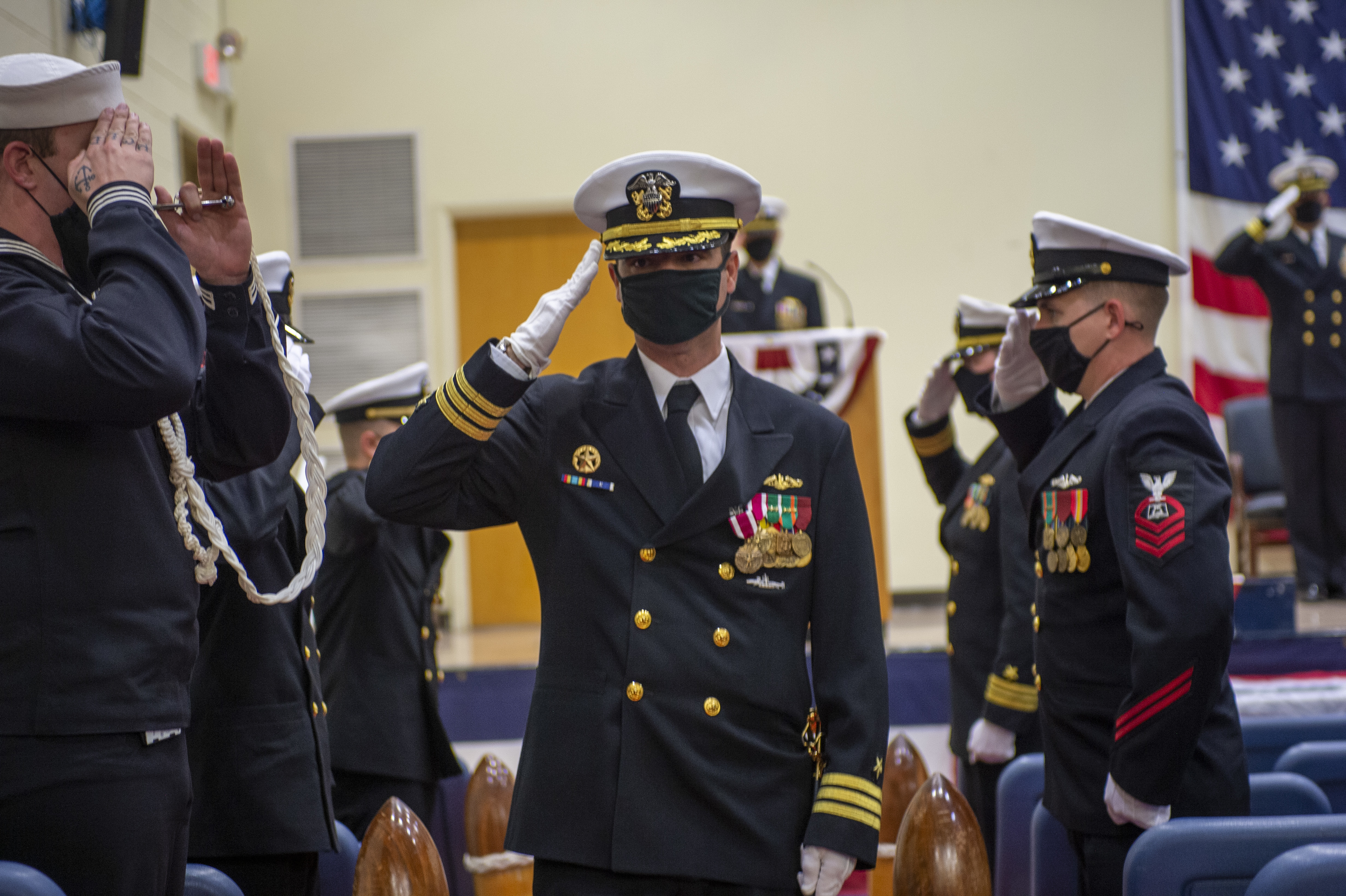 Cmdr. Kristopher Lancaster is piped ashore following a change of command ceremony for the Los Angeles-class attack submarine USS Boise (SSN 764) at Naval Station Norfolk, Oct. 30, 2020.