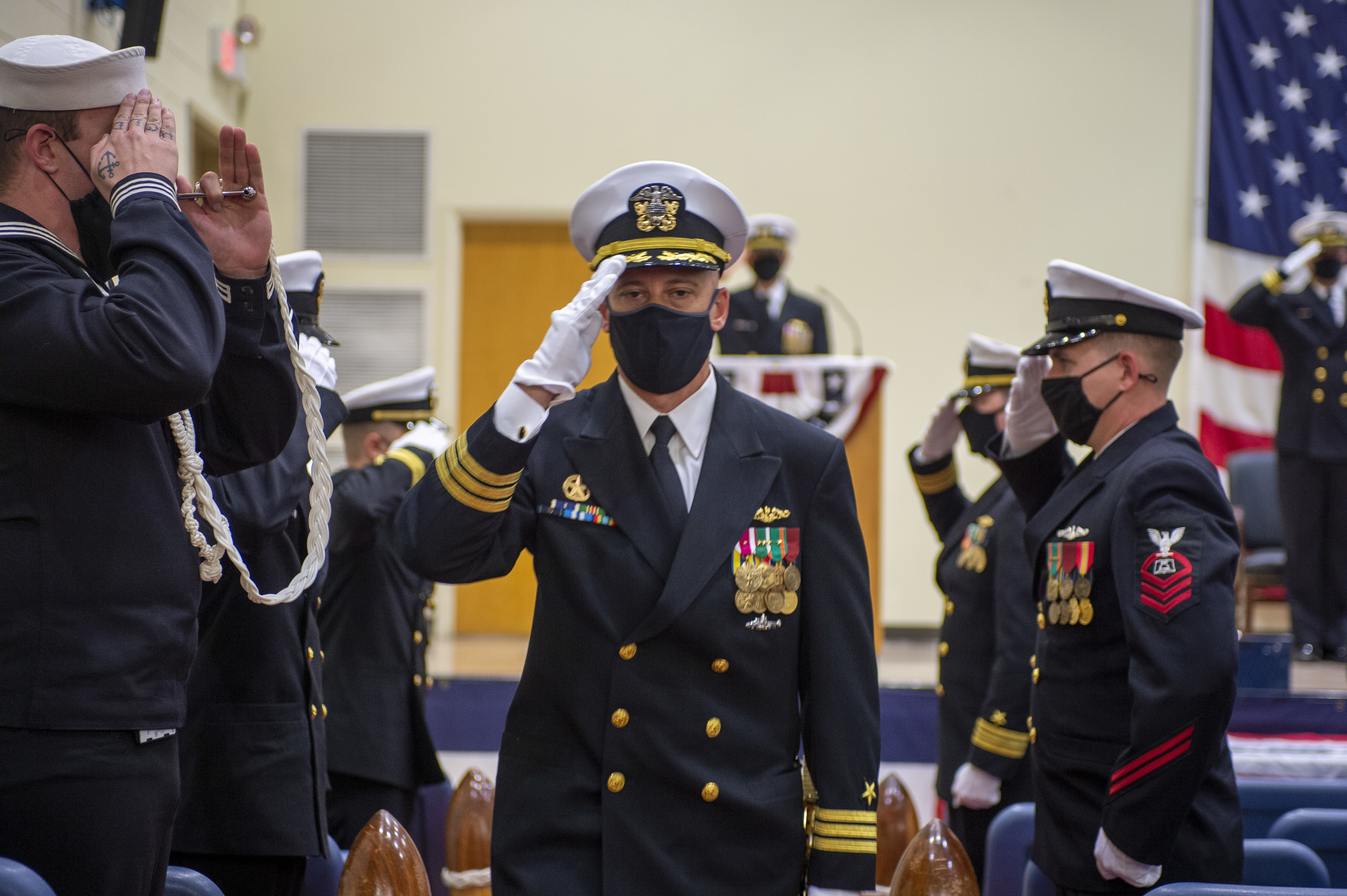 Cmdr. Jonathan Cantor, commanding officer of the Los Angeles-class attack submarine USS Boise (SSN 764), is piped ashore following a change of command ceremony at Naval Station Norfolk, Oct. 30, 2020.
