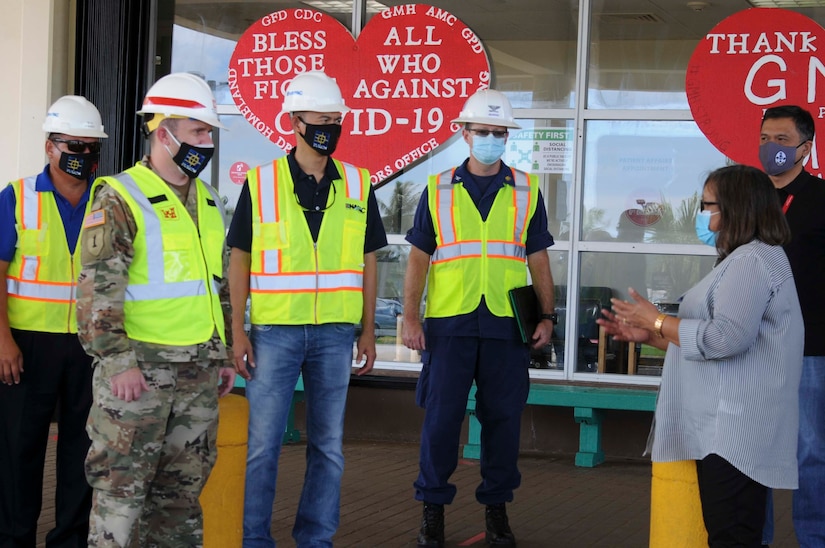 A Guam Memorial Hospital administrator thanks federal and local workers for their help in completing a COVID-19 project.