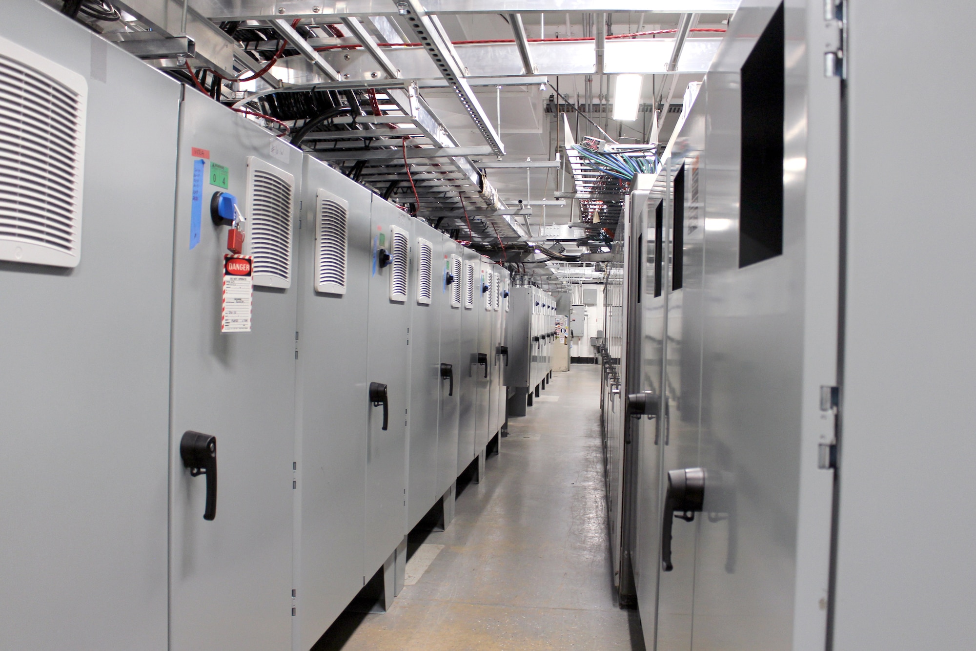 New nozzle drive cabinets, shown here Sept. 25, 2020 at Arnold Air Force Base, Tenn., house the new drive hardware that operates the 108 motors required to power the Arnold Engineering Development Complex 16-foot supersonic wind tunnel nozzle. (U.S. Air Force photo by Deidre Moon)