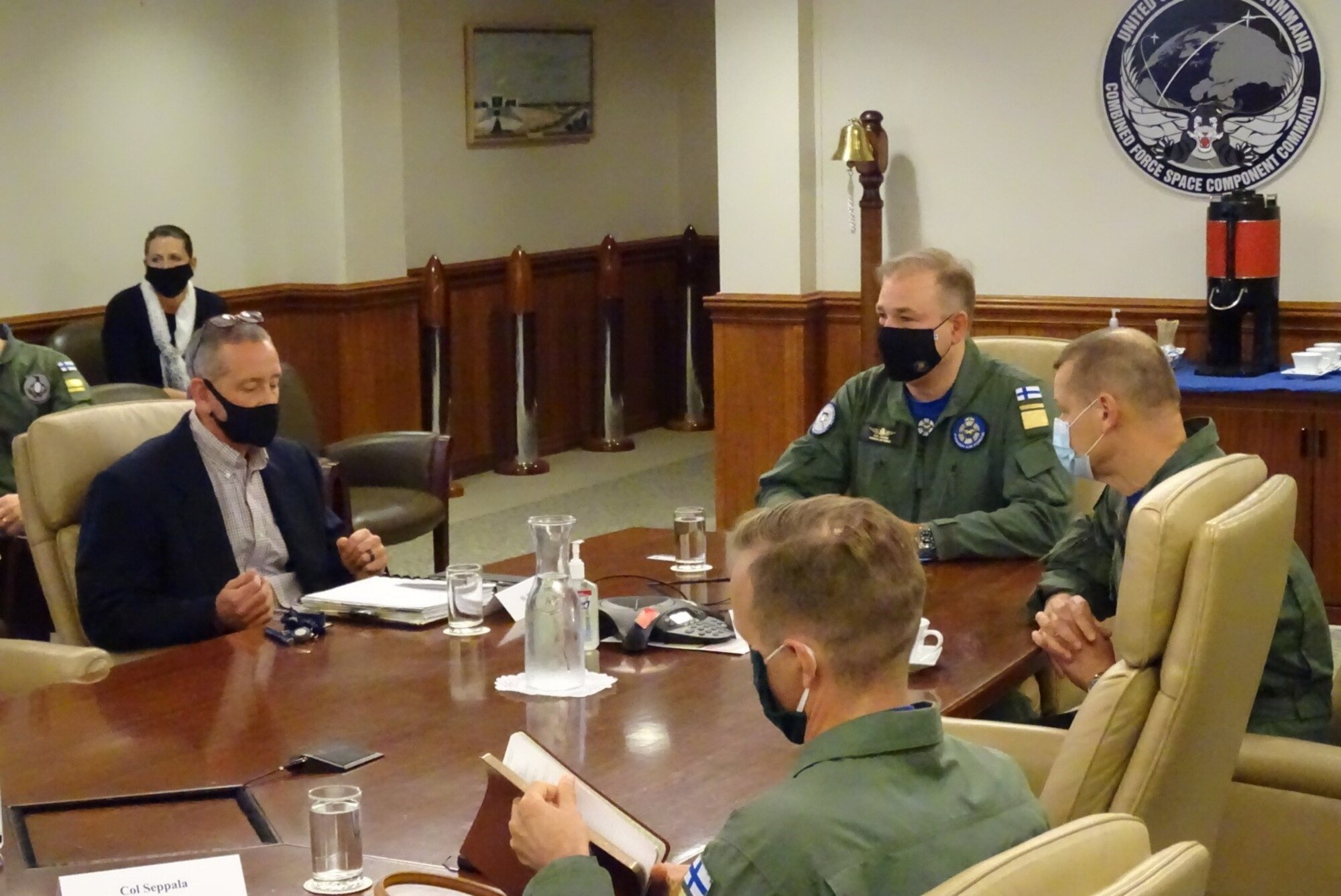 Photo of group at conference table