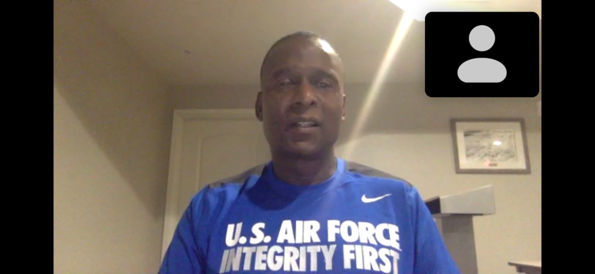 Screen shot of retired Chief Master Sergeant Juan Lewis speaking virtually to 18th Air Force staff