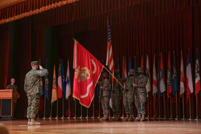 A U.S. Marine salutes the battalion colors during the unit’s activation ceremony on Camp Foster, Okinawa, Japan, Nov. 2.