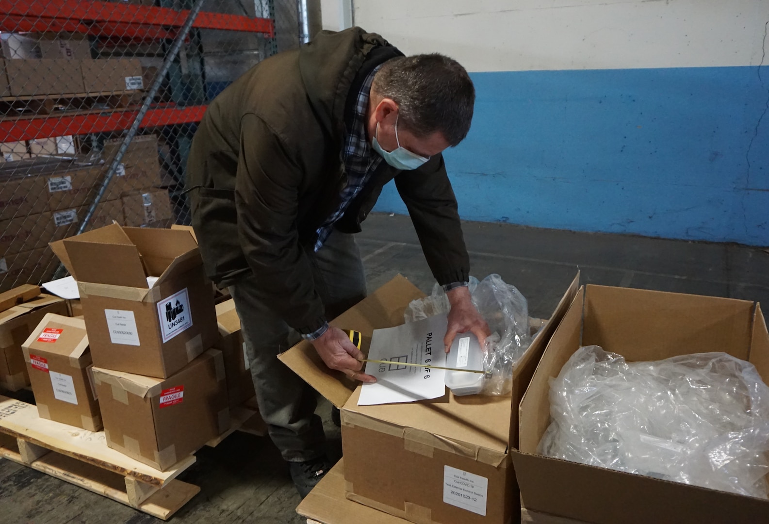 DLA Distribution packs, ships COVID-19 rapid test kits for nursing homes, troops