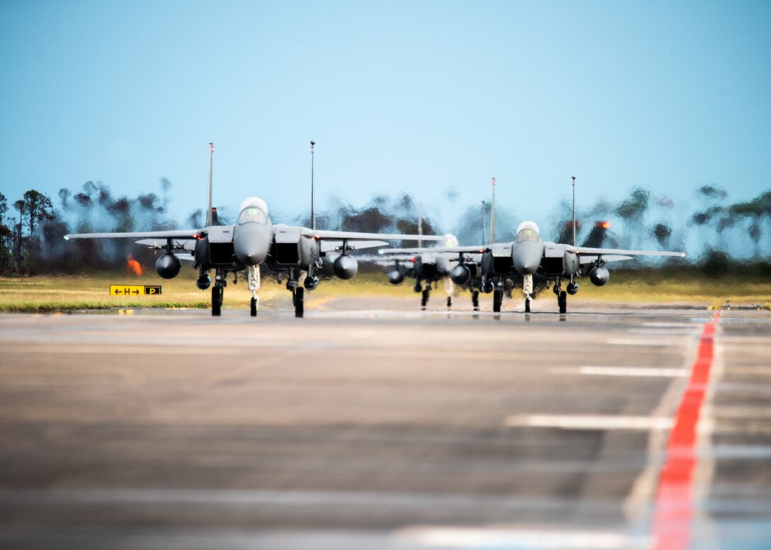 F-15 Eagles taxing