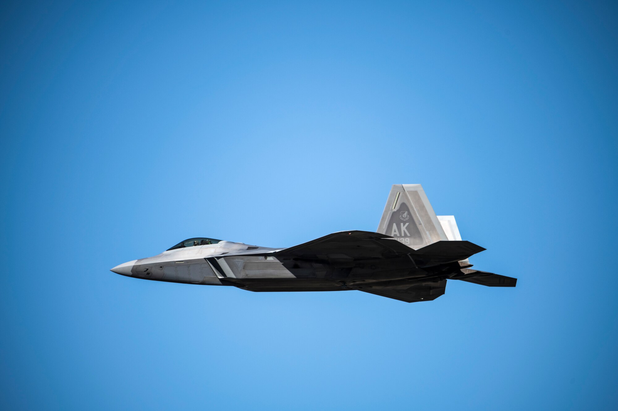 An F-22 Raptor assigned to the 90th Fighter Squadron from Joint Base Elmendorf-Richardson, Alaska, prepares to land at Tyndall Air Force Base, Florida, Oct. 30, 2020. The aircraft arrived to participate in a large-force exercise known as Checkered Flag. (U.S. Air Force photo by Airman 1st Class Tiffany Price)