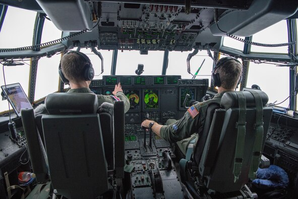 Maj. Lucas Caulder and Maj. Ben Blair, pilots for the 53rd Weather Reconnaissance at Keesler Air Force Base, Miss., maneuver their WC-130J through the cloudy eye of Hurricane Eta November 3, 2020. The 53rd WRS, also known as the Hurricane Hunters, provide valuable information to forecasters at the National Hurricane Center in realtime to best prepare affected areas. (U.S. Air Force photo by Senior Airman Kristen Pittman)