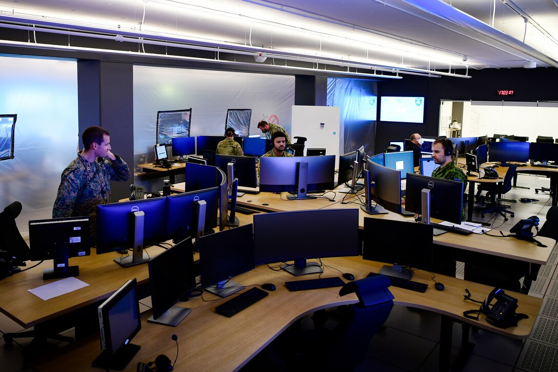 NATO forces conduct fighter control, and fighter allocation operations in support of Icelandic Air Policing from the Control and Reporting Center at Keflavik Air Base, Iceland Oct. 26, 2020. Composed of U.S. Airmen, a U.S. Marine, Estonia Defence Force and Icelandic Coast Guard personnel, the CRC uses surveillance, identification, weapons control, battle management, and theater communications data capabilities to command and control all of the air operations for the IAP mission. (U.S. Air Force photo/ Master Sgt. Matthew Plew)