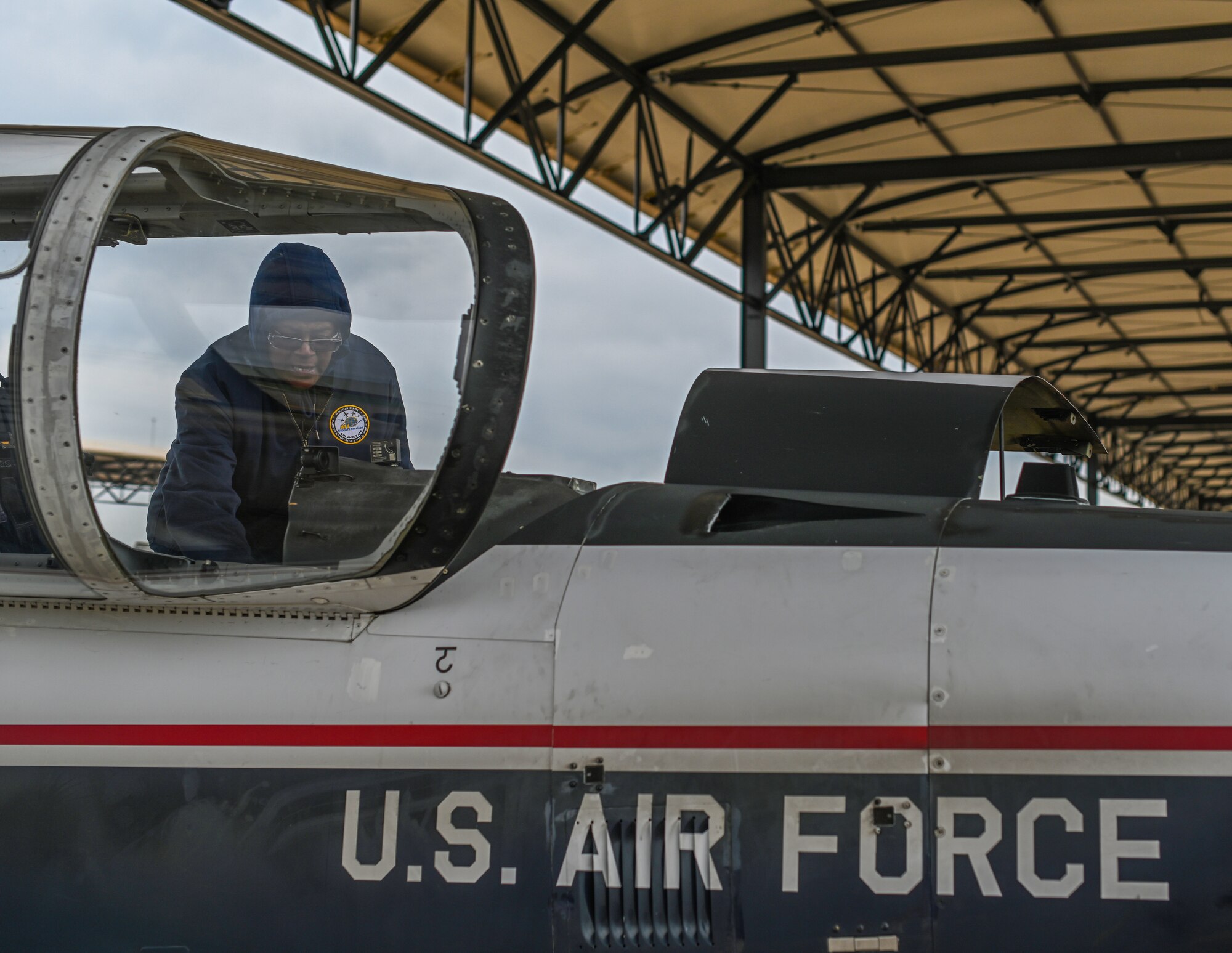 Charlotte Lindsey, M1 Support Services T-6A Texan II maintainer, prepares the cockpit of a T-6 on Oct. 30, 2020, at Columbus Air Force Base, Miss. The T-6 is fully aerobatic and features a pressurized cockpit with an anti-G system, ejection seat and an advanced avionics package with sunlight-readable liquid crystal displays. (U.S. Air Force photo by Airman 1st Class Davis Donaldson)