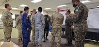 Military officers from Brazil, Colombia and Peru conduct mission analysis as part of the Planning in Crisis exercise Oct. 28 hosted by U.S. Army South and held at Joint Base San Antonio-Fort Sam Houston, Texas, Oct. 26-30. The exercise allowed partner nations from the Western Hemisphere to plan and develop an operation order with component commands in preparation for the U.S. Southern Command PANAMAX exercise.

PANAMAX is an annual U.S. Southern Command-sponsored training exercise series with the objective of demonstrating the capability of participating nations to conduct coalition operations and is focused on ensuring the security of the Panama Canal and the surrounding region.