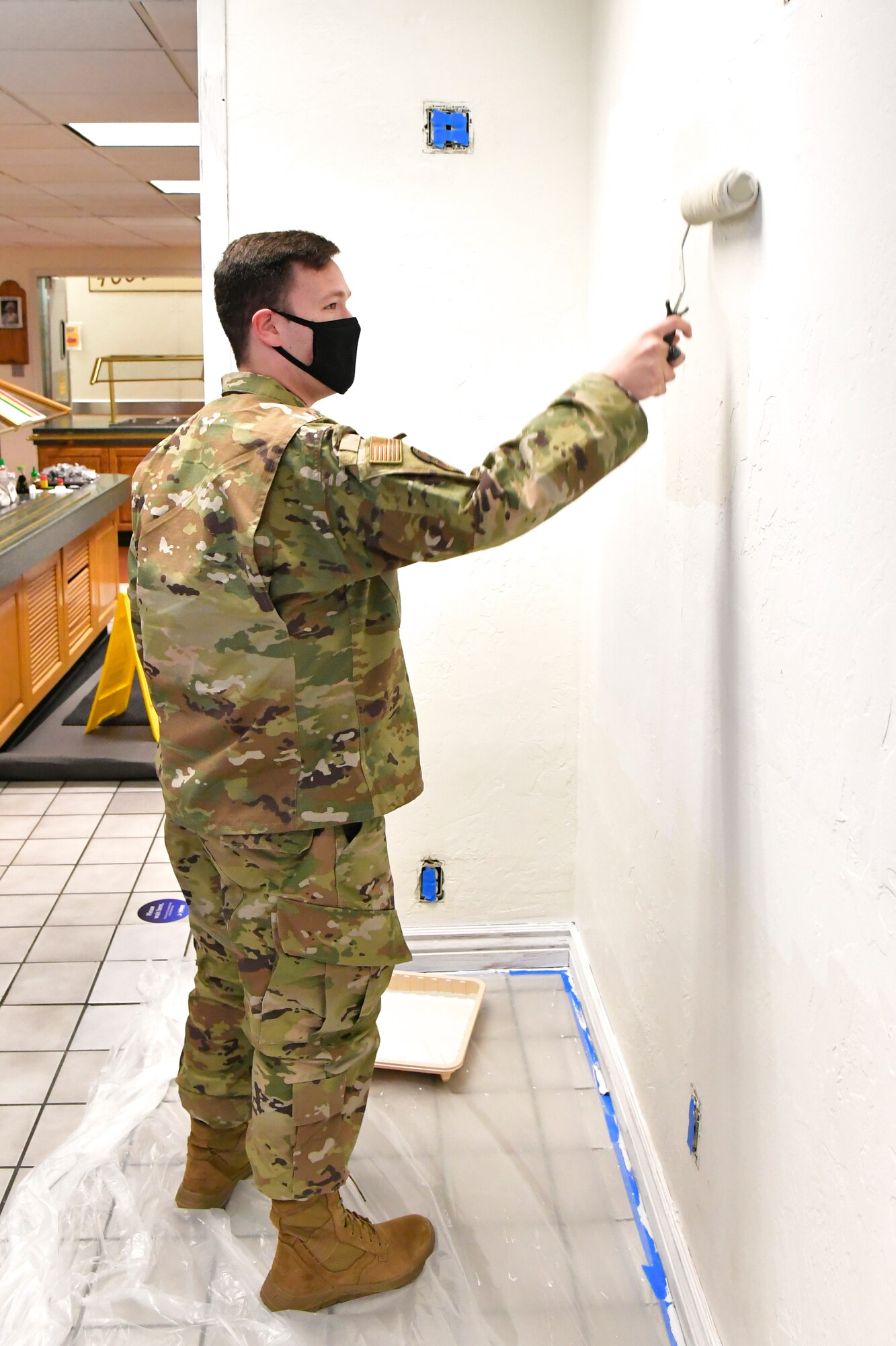 Airman 1st Class Dawson Sigetti, 75th Force Support Squadron, paints the interior of a dining facility Oct. 27, 2020, during a self-help renovation project on Hill Air Force Base, Utah. The DFAC facelift work is being accomplished by food service staff and many volunteer Airman from various squadrons across the base. (U.S. Air Force photo by Todd Cromar)