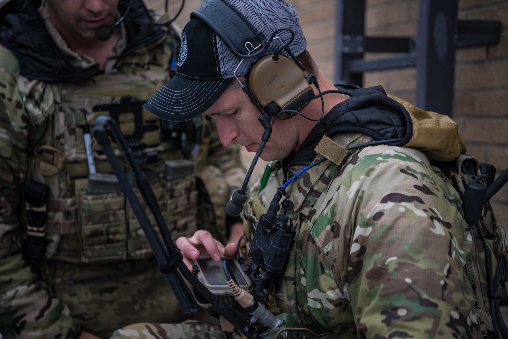 Tech. Sgt. Jeremy Miter, a 274th Air Support Operations Squadron joint terminal attack controller, controls aircraft during Exercise Bold Quest 20.2 at Muscatatuck Urban Training Center near Butlerville, Indiana, Oct. 28, 2020. Led by the Joint Staff, Bold Quest is a multinational exercise that demonstrates a joint capability to link sensors to shooters across air, land, sea, space and cyberspace.